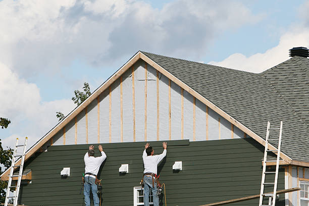 Professional Siding Contractor technician working in State Road, NC